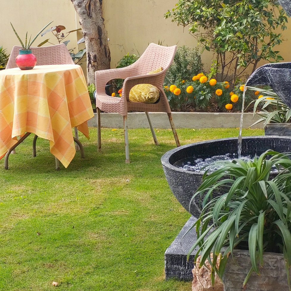 garden with water feature and flowers